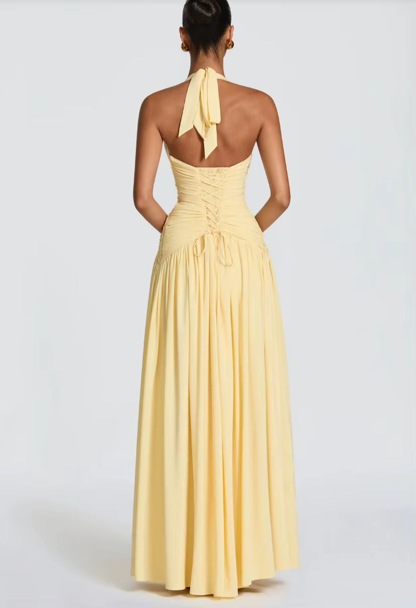 Robe spéciale occasions jaune pastel longue avec grande fente et décolleté v