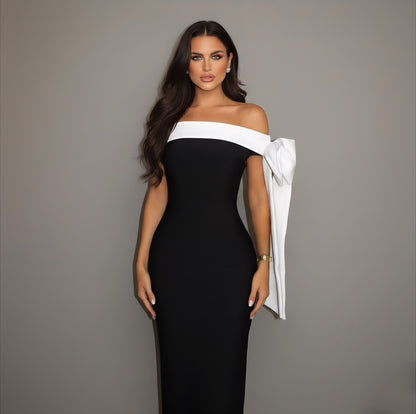 Robe bandage haute qualité noire et blanche détails nœuds longueur midi  