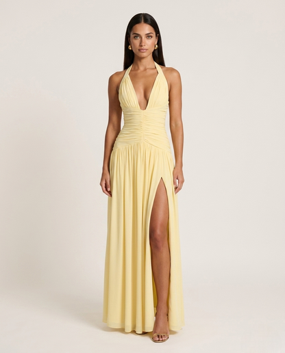 Robe spéciale occasions jaune pastel longue avec grande fente et décolleté v  