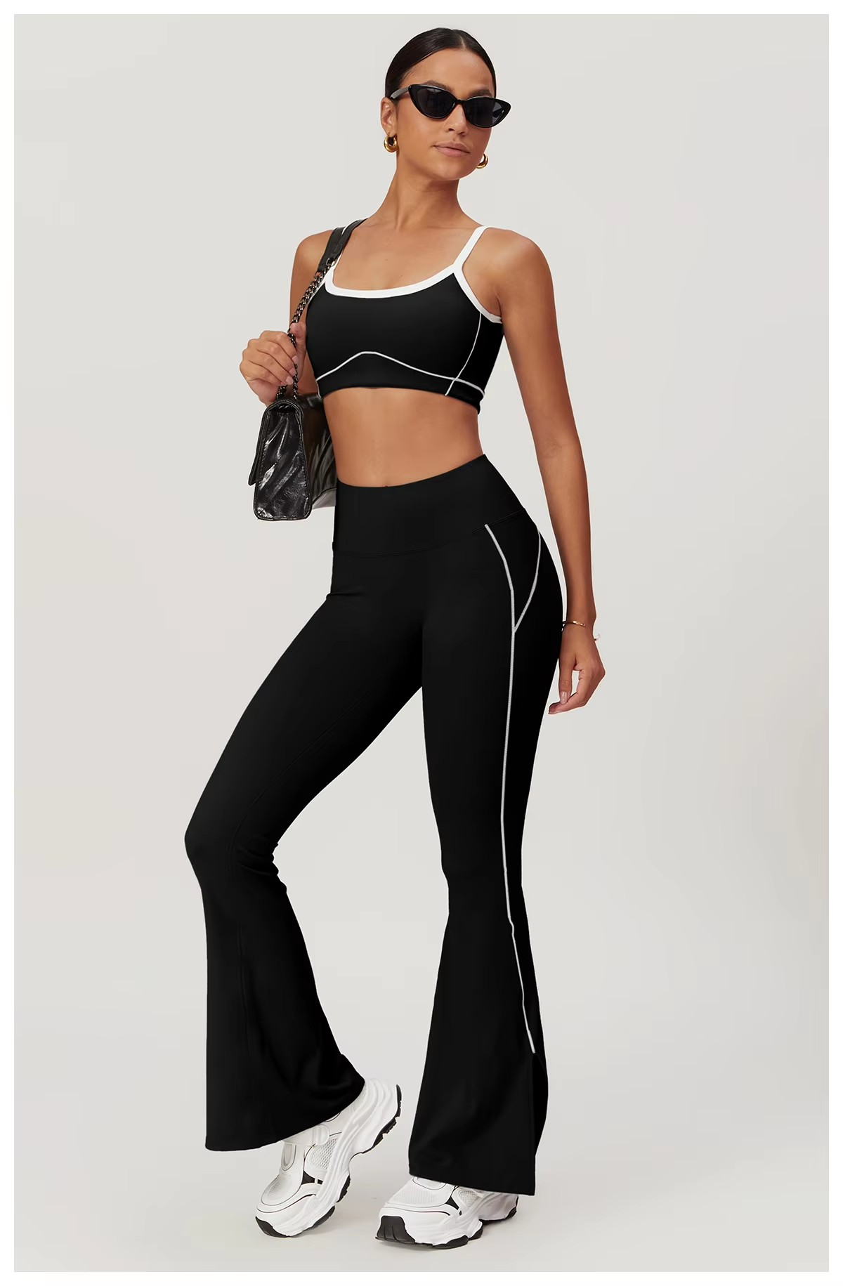 ensemble deux pièces de sport pour femme brassière et pantalon flaire noire