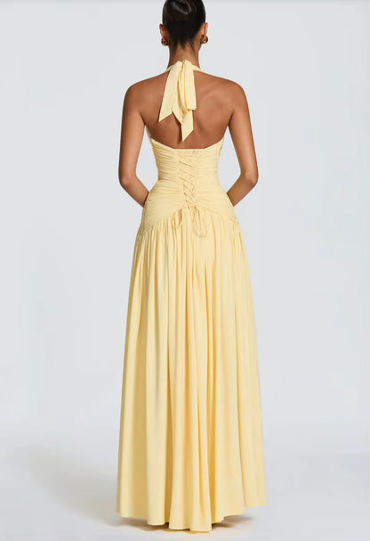 Robe spéciale occasions jaune pastel longue avec grande fente et décolleté v  